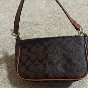 Brown leather coach bag